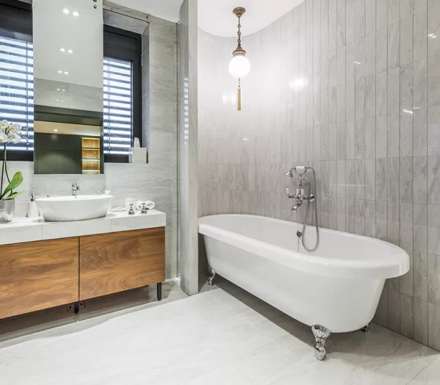 Mid-sized marble bathroom space